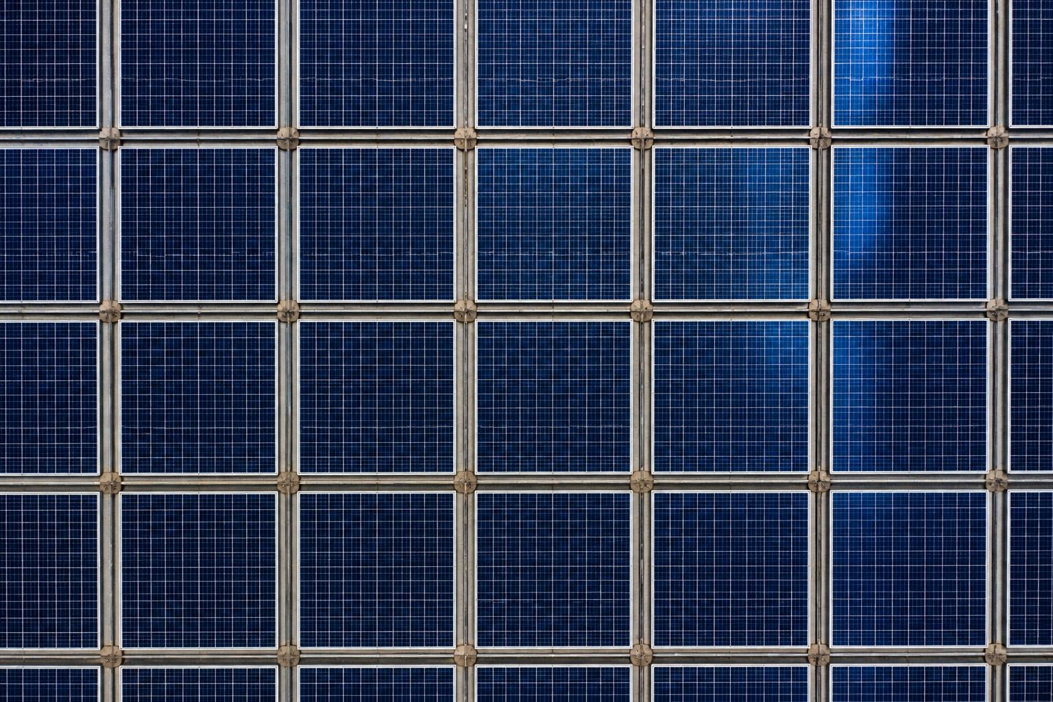 Solar array forming a geometric grid